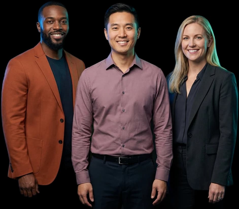 Three job seekers smiling at the camera